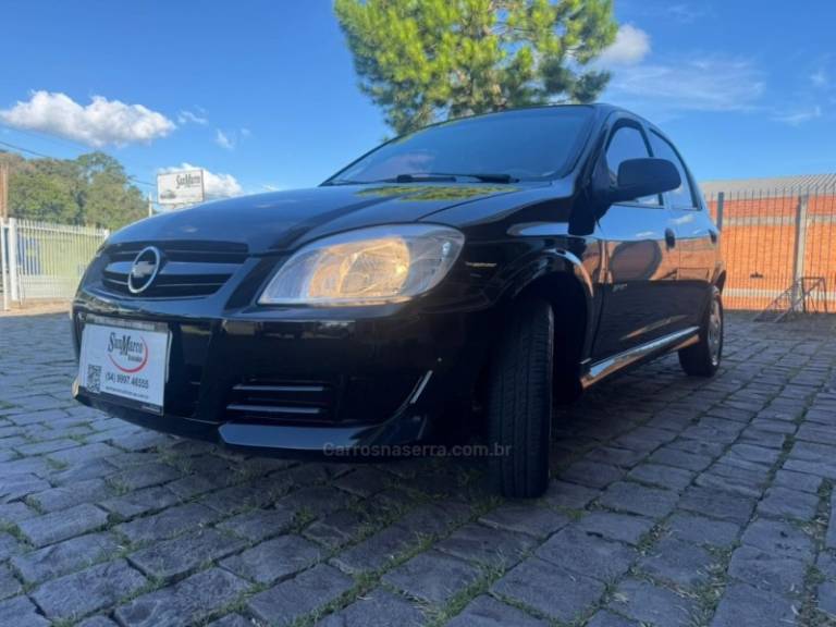 CHEVROLET - CELTA - 2009/2010 - Preta - R$ 27.000,00