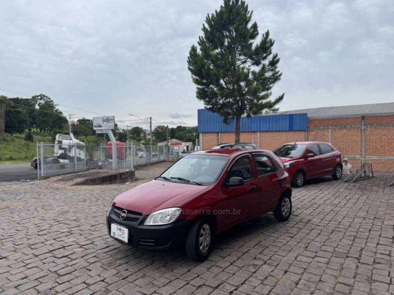 CHEVROLET - CELTA - 2009/2010 - Vermelha - R$ 23.000,00