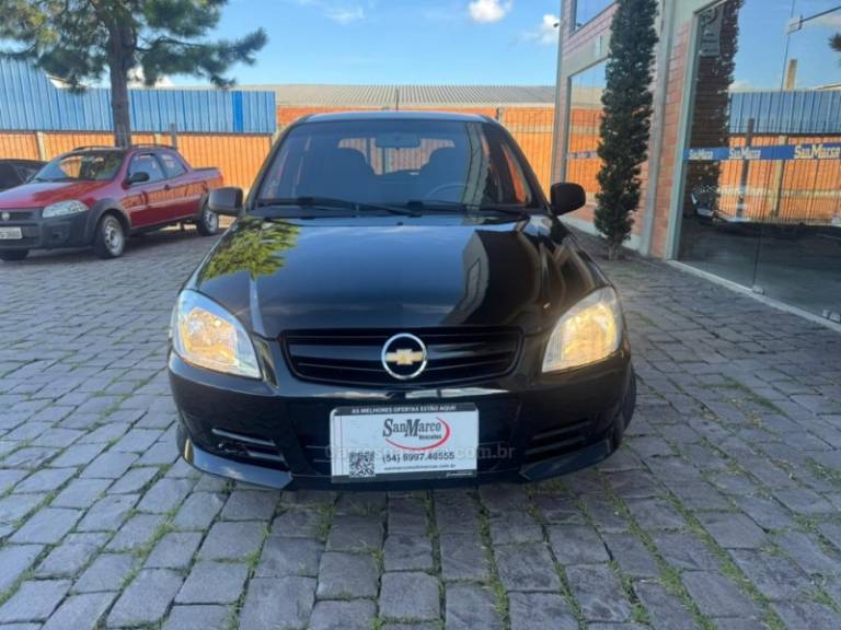 CHEVROLET - CELTA - 2009/2010 - Preta - R$ 27.000,00